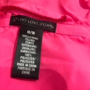 women’s size medium zip up vest.